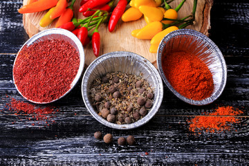set spice pepper garlic bay leaf barberry turmeric dark wood background retro style