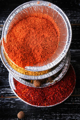 pepper set spice turmeric barberry dark wood background retro st