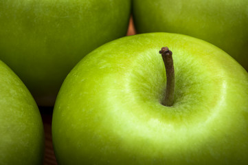 Macro of delicious green apples, healthy snack options low in fat and high in fiber and vitamins