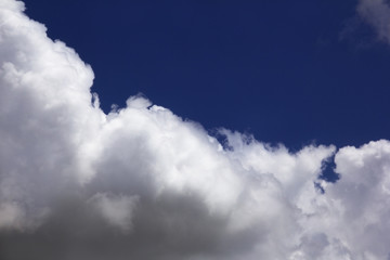 clear blue sky with large clouds