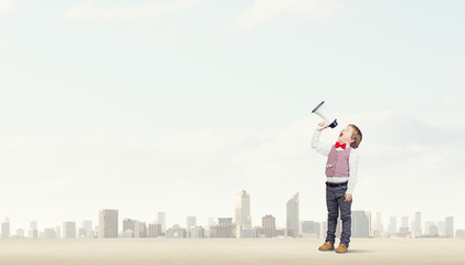 Obraz premium Kid boy with megaphone