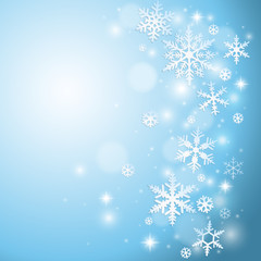 Winter background with snowflakes on blue