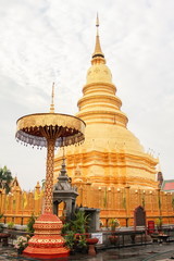 Fototapeta premium Wat (Temple) Phra That Hariphunchai is a famous landmark of Lamphun province, Thailand.
