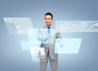 businessman in suit working with virtual screens