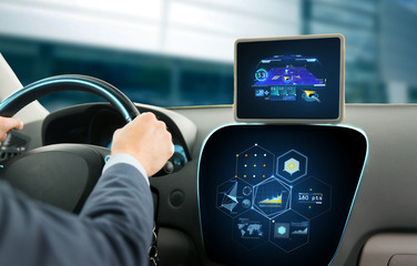 close up of man driving car with navigation system