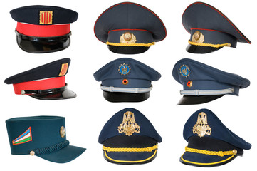 Collection of police peak-caps.