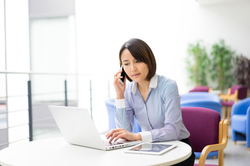 Fototapeta premium Asian businesswoman working at the office