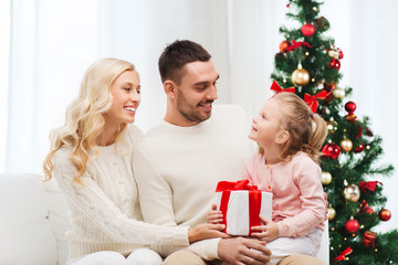 Obraz na płótnie Canvas happy family at home with christmas tree
