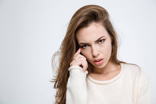 Thoughtful Woman Looking At Camera