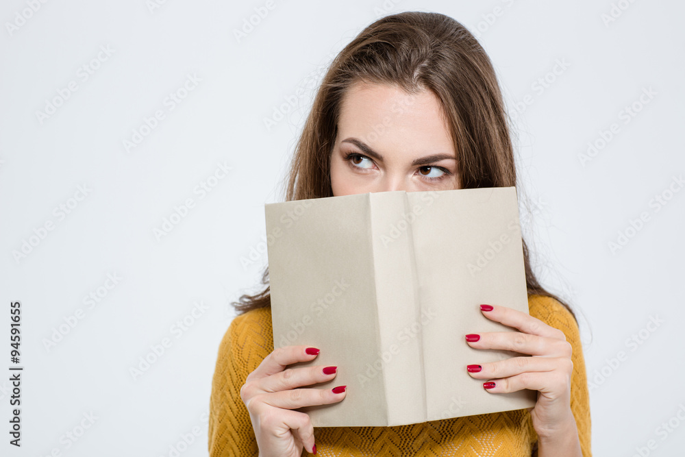 Sticker woman covering her face with book