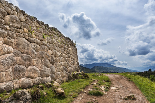 Ancient Inca stone wall in the Pakapukara ruins, near Cuzco, Peru