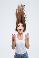 Crazy woman with hair up into air