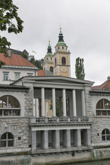 Fototapeta na wymiar Central Market and Saint Nicholas Cathedral. Ljubljana, Slovenia.