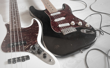 Vintage dirty worn electric guitar and bass