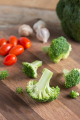 Obraz na płótnie Canvas Fresh broccoli slice on the wooden cutting board.