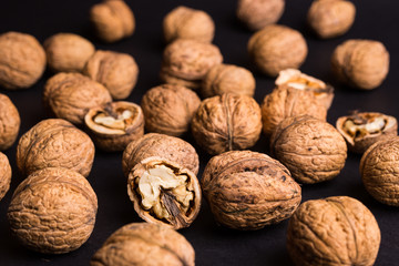 walnuts on a black background