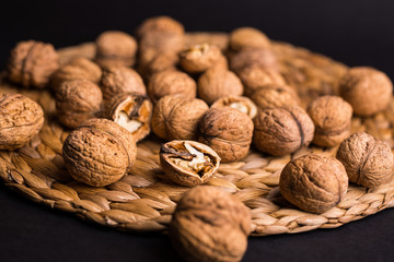 walnuts on a wicker background