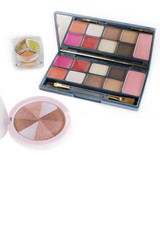 colourful of makeup palette and highlighter on white background