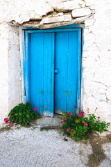 Vintage blue door in a village. Cyprus