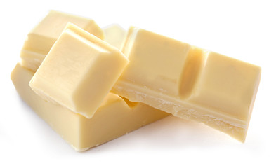 White chocolate pieces isolated on white background
