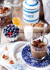 Oatmeal granola glazed with molasses, coffee, milk, fresh berries. 