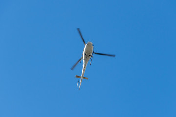 Helicopter in front of blue Sky