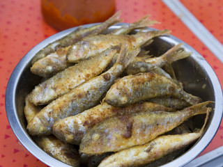 Fish surmullet in the cooking process