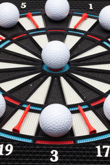 Detail dartboard with golf balls