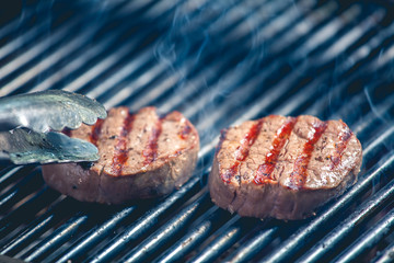 Delicious steak on grill