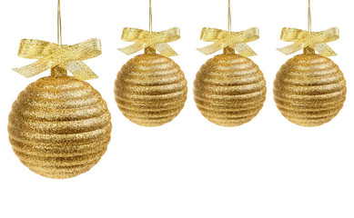 Four golden christmas balls with golden ribbon isolated on white