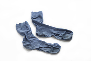 Clean laundered men's socks on a white background