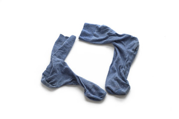 Clean laundered men's socks on a white background