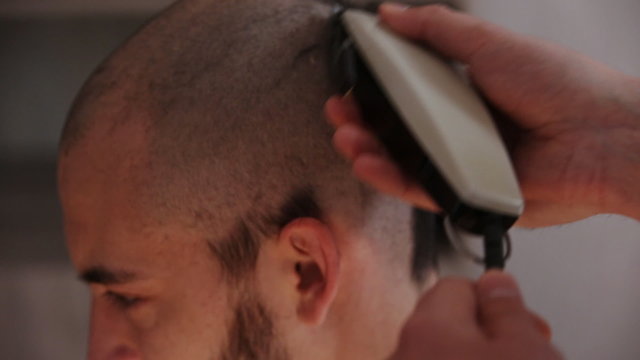 the guy with the beard shaved head