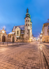 Fototapeta na wymiar Krakow, Poland, romanesque church of Saint Andrew on Mary Magdalene square in blue hour, winter morning.