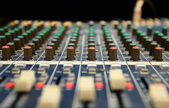 Close up of professional mixing console for music