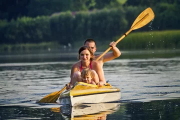 Foto op Canvas Family in the canoe © wrzesientomek