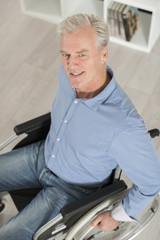 Portrait of disabled man on wheelchair