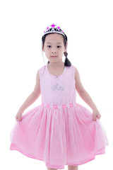 Cute Asian little princess girl in silver crown and pink dress o