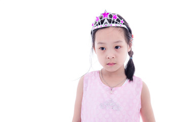 Cute Asian little princess girl in silver crown and pink dress o