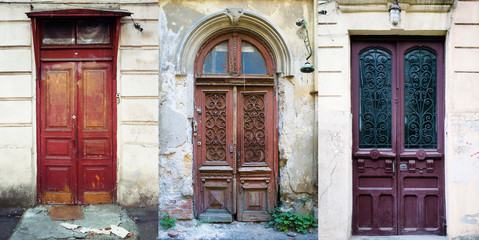 Fototapeta na wymiar set of three vintage red doors