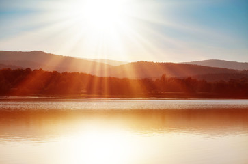 Fototapety  słońce nad jeziorem