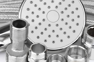 Plumbing fitting, hosepipe and showerhead, close up, DOF