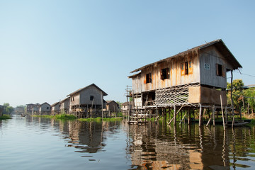Fototapeta na wymiar Floating village houses in Inle Lake, Myanmar