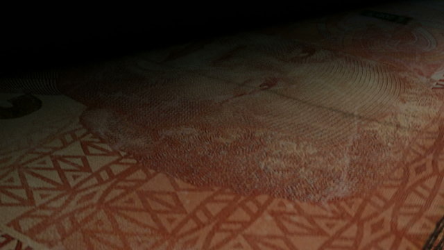 An extreme closeup of south african rand banknotes flipping through in a counting machine