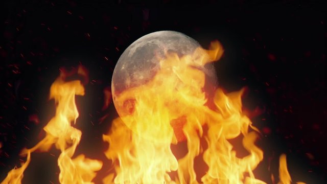Moon Passing Behing Raging Fire