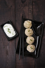 Asian-style meat dumplings with cream sauce