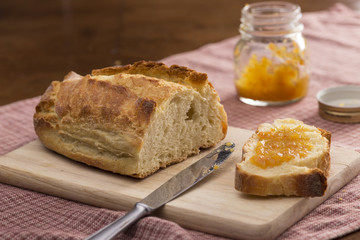 Orange jam and bread for breakfast