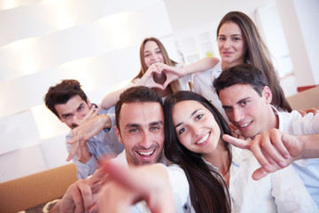 group of friends taking selfie