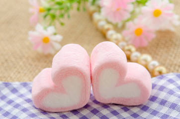 sweet heart shape of pink marshmallows.