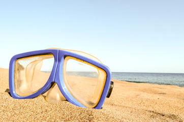 Diving Mask on the Sand Beach